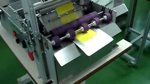 Tach-It Envelope Labeler Operating on Bags