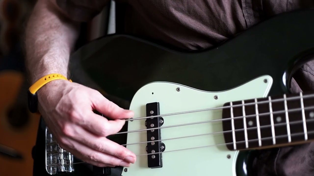Does the Jazz Bass pickup cover affect the way it sounds?