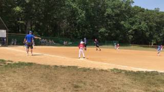 Bray chasing the third base runner down at home