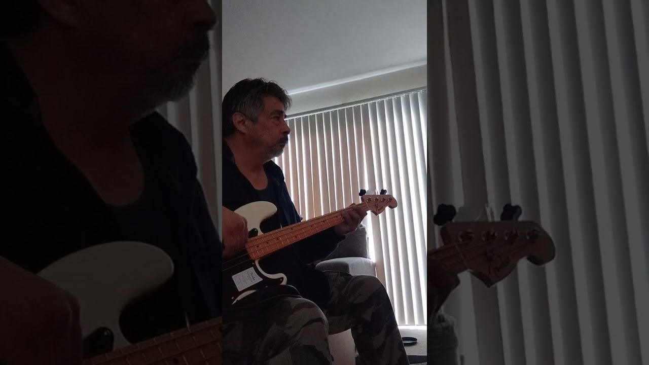 Gimme Shelter on bass guitar.