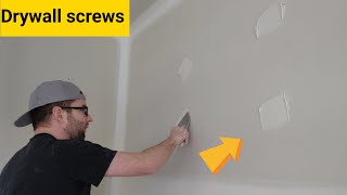 How many coats on drywall screws?