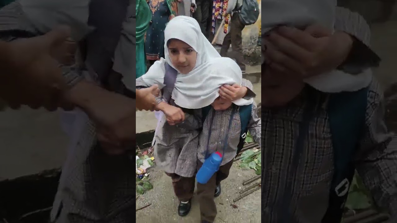 Sister shielding brother from rain in Doda, wins hearts online