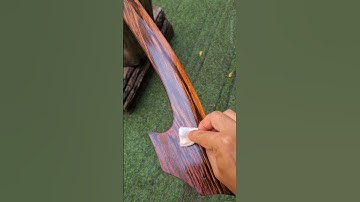 Apply coconut oil to the rosewood axe handle #craftsmanship #satisfying
