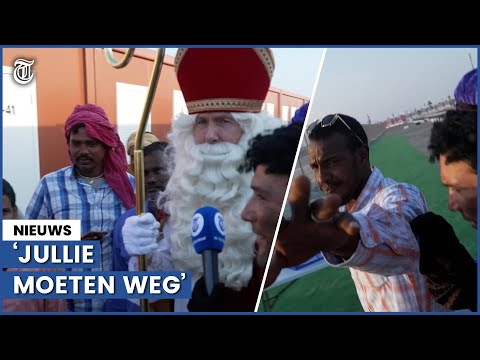 Chaotisch bezoek Sinterklaas aan containerkamp Qatar: ?Helemaal verbijsterd!?