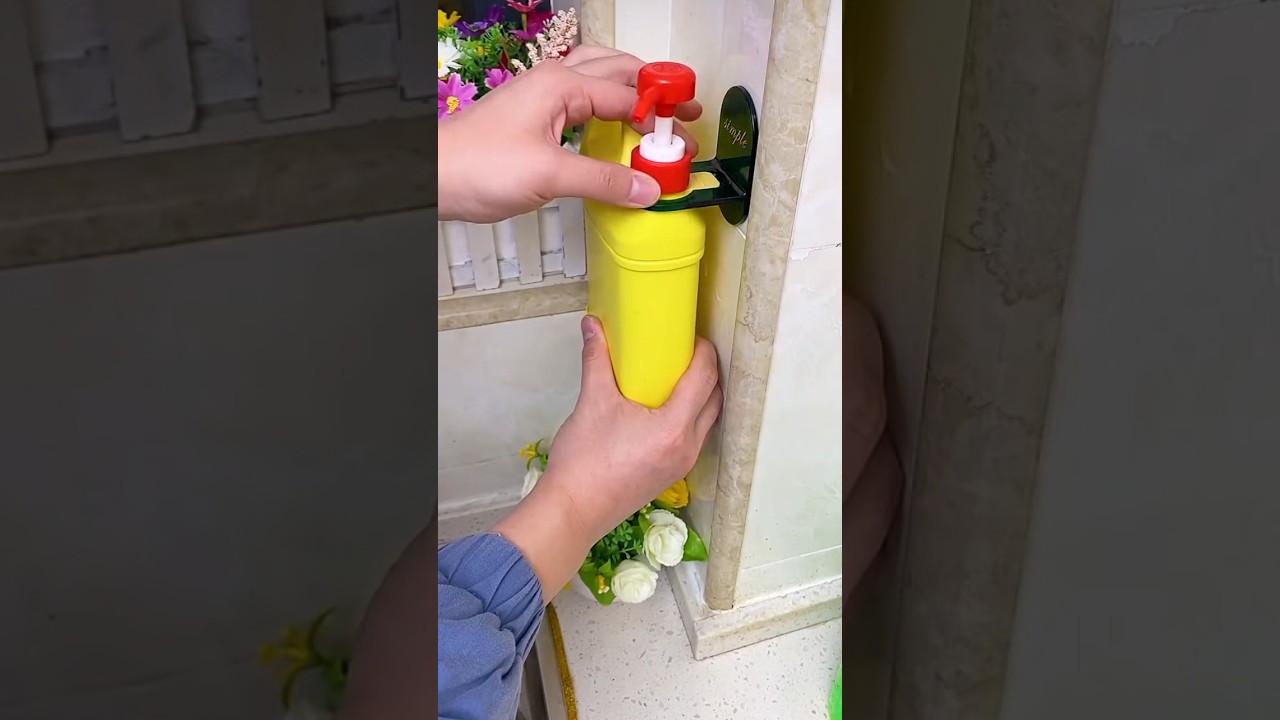 wall-mounted shower bottle holder, also known as a shampoo or shower gel holder | technologya