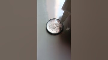 How many drops of water can a coin hold #experiment #coin #scienceexperiment
