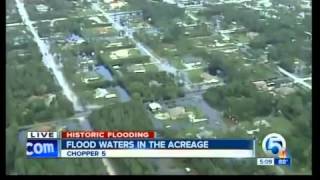 Chopper 5 flies over flood waters in The Acreage