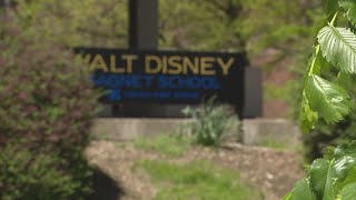 Mother charged after 2nd grader brings gun to North Side school; child suffers graze wound