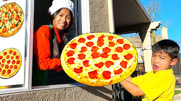 Wendy and Eric at Pizza Drive Thru Restaurant School