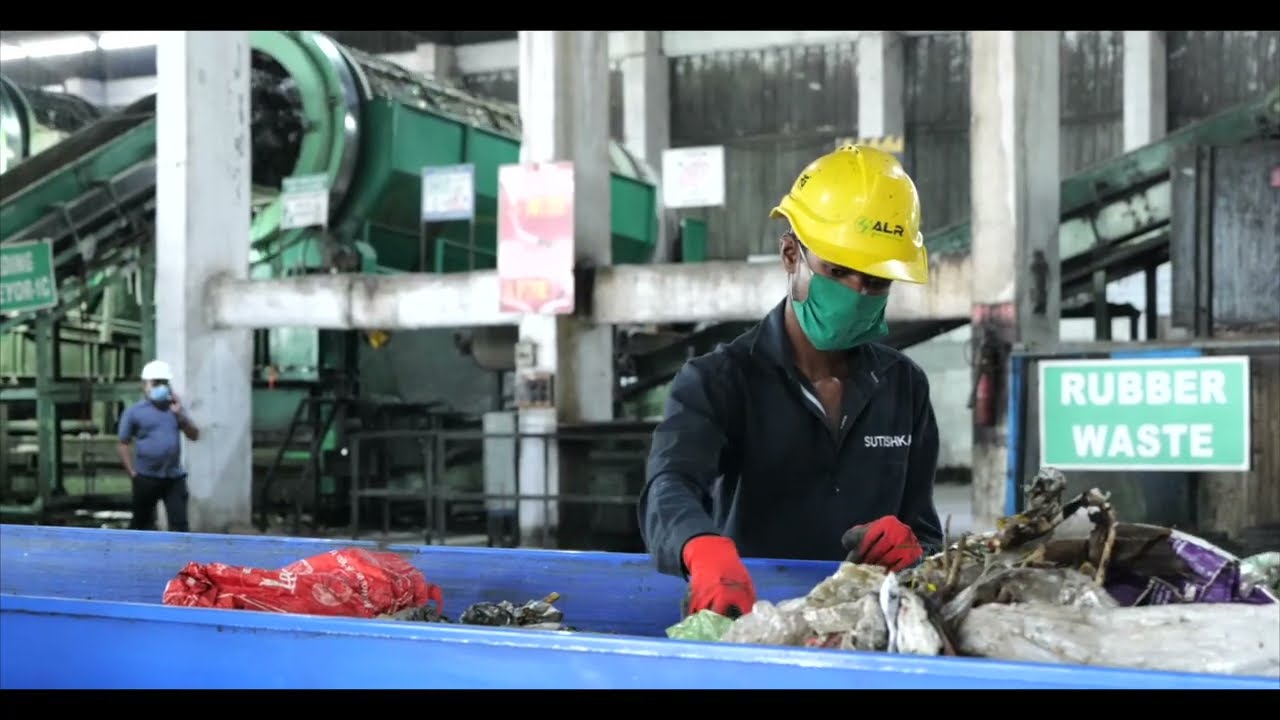 Sorting for a Cleaner Future - Conveyor belt at Moshi Kachra Depo supported by BMC Software India.