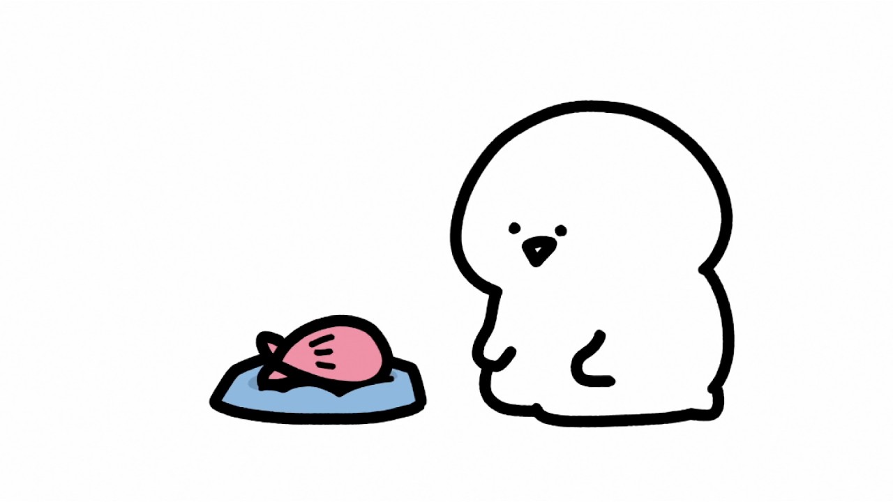 拾った貝をこじ開ける