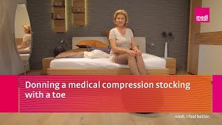 Donning a medical compression stocking with a toe