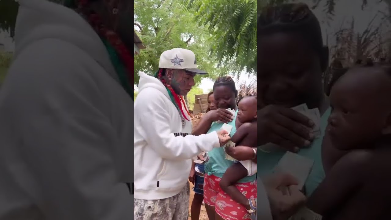 Tekashi 69 giving money to poor people of the Dominican Republic