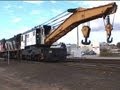 Railink gets the big hook out to re-rail a CP locomotive. North Bay, ONT.  9/16/1999