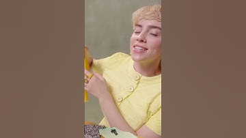 Billie goes through the miniature outfits in the “What Was I Made For?” video, watch on YouTube now.