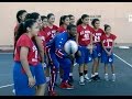 St Anne School of Santa Ana learn basketball tricks from a Harlem Globetrotter