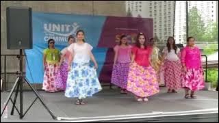 Performing at Unity in the Community folk dance Paru-parong bukid (Butterfly in the field)