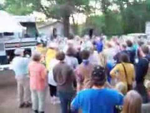 A thank you to volunteers who helped in the search for Keith Kennedy by Burnett County Sheriff Dean Roland. Upon shutting down of weeklong search operations at Trade Lake Camp in Burnett County, Wisconsin on June 22, 2008. Many had already left to go home at this point in the day, or had volunteered on previous days, so this toast was very much for them as well. This was taken with the movie mode of my Kodak digital camera. The camera ran out of memory midway through, so this clip cuts off prematurely.