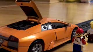 Lamborghini Gallardo is stuck on rail tracks! Can the passenger lego train 60197 avoid the accident?