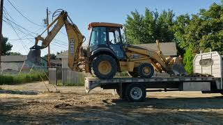 Loading Backhoe onto Flatbed without ramps