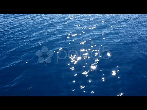 Blue Sea Water View From A Moving Boat With Sparkles And Light Reflections. Stock Footage