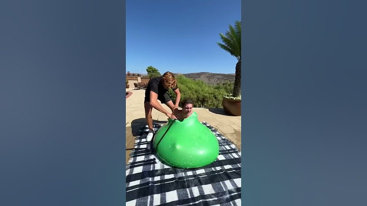Fitting a person inside of a giant water balloon!👀💦