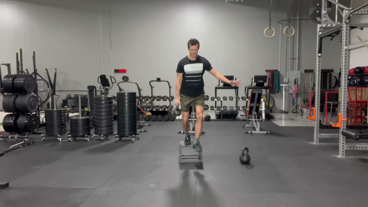 Suitcase Carry Drop from Step