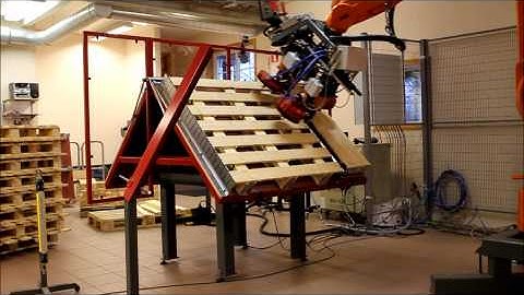 Robot nailing pallet with four nailers Ekatech AB