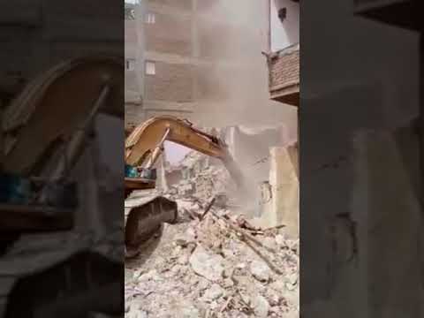 إزالة عقارات بعزبة الهجانة لتنفيذ محور شينزو ابي