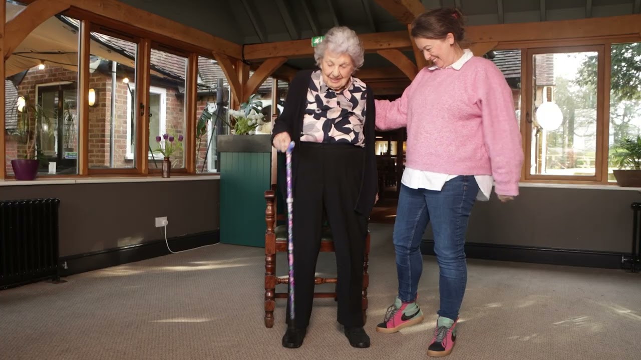 Heather standing up safely in this training video