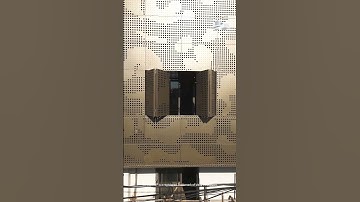 Unique Residential Facade with Fluid Design and Timeless Appeal - A Fusion of Form & Function