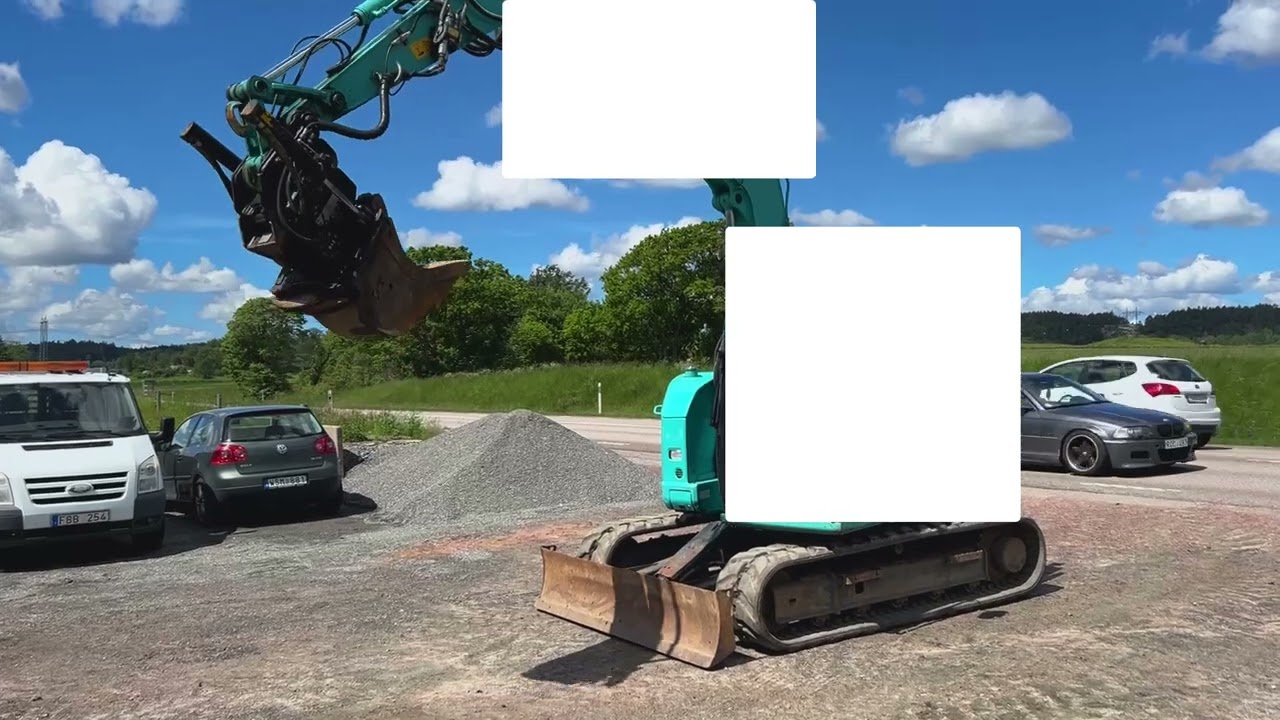 Bandgrävare Kobelco SK75SR med rotortilt och skopor