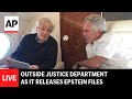 LIVE: Outside Justice Department as it releases Epstein files