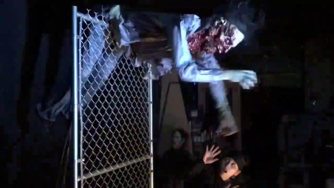 Thrashing Fence Zombie Animated Prop