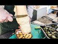Swiss Raclette. Huge Melted Cheese Tasted in Prague. Street food of the Czech Republic