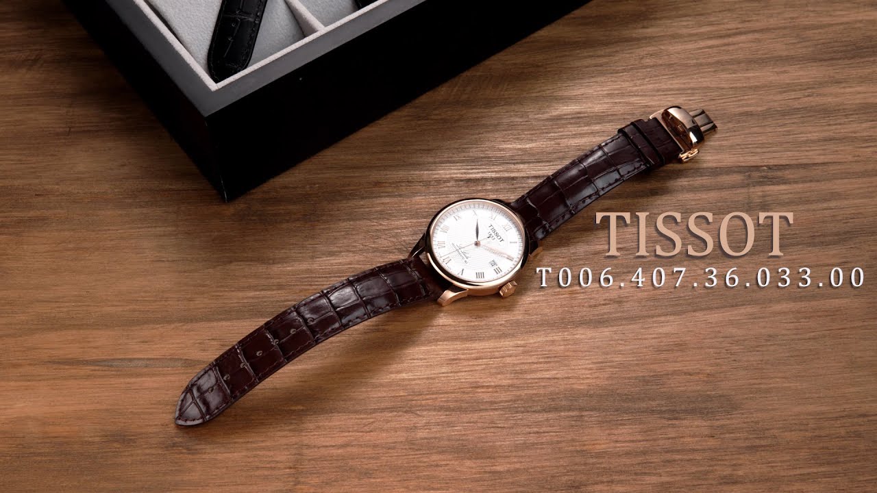 Review đồng hồ Tissot T006.407.36.033.00 mặt số bằng họa tiết Guilloche.