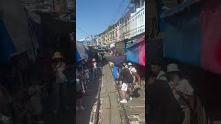 Onboard the world famous Market train - Maeklong Thailand