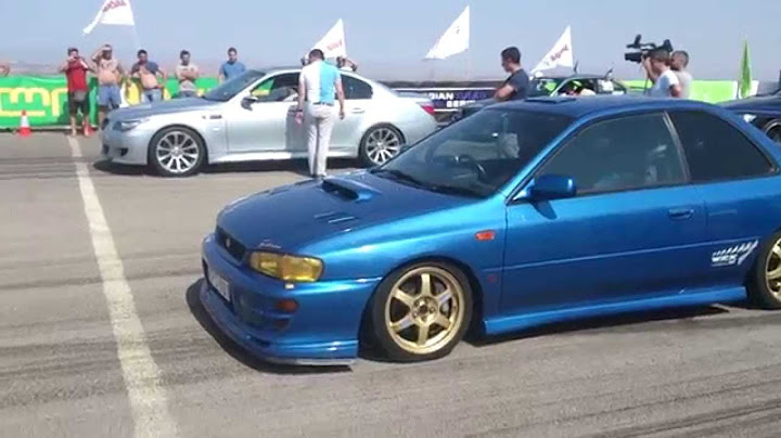 subaru  impreza vs bmw M5 drag challenge