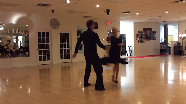 Mr Jewett dancing his open cha cha with Ms Julia a...