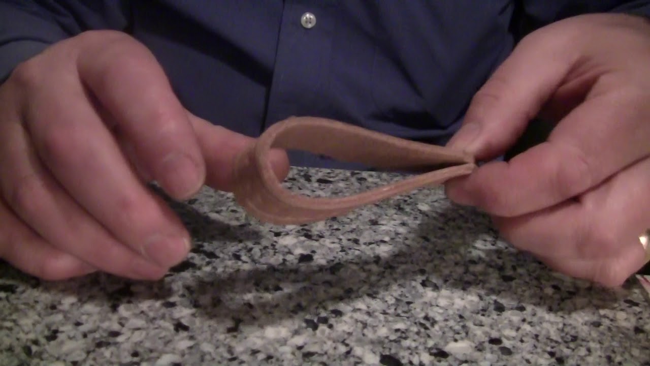 The making of a leather pipe stand.