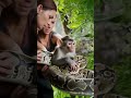 Three women try to help the monkey escape from the python's grip#shorts