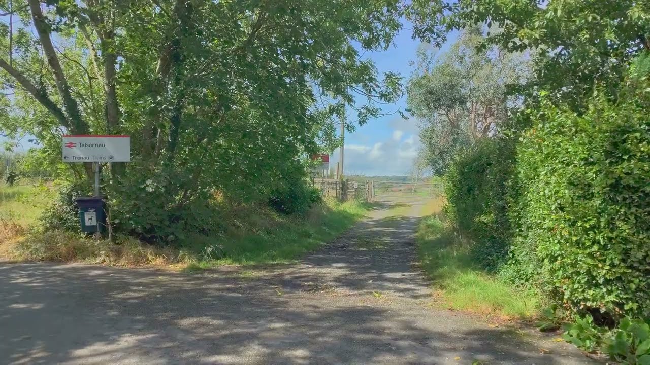 Railtour going across a crossing in Talsarnau 