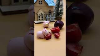 Two piglets eating cherries cute parent-child stop motion animation