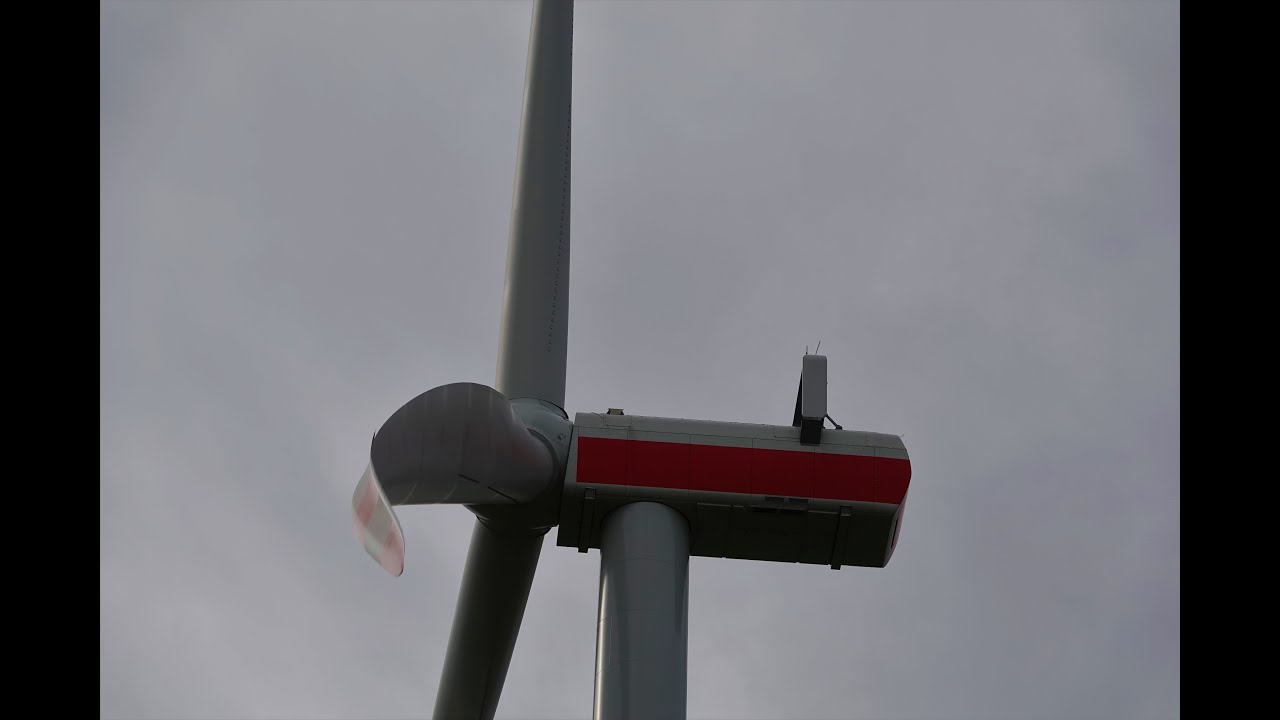 Wind farm Kölsa during storm Eugen/Vestas V150, Eno126 wind turbines with strong tower fluctuations