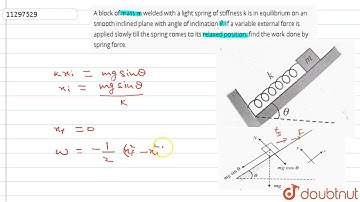 A block of mass m welded with a light spring of stiffness k is in equilibrium on an smooth incli...