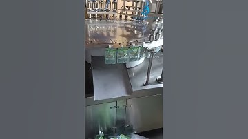 Automatic 5 nozzles premade drink bag pouch rotary filling screw capping machine testing video