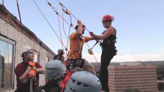 Lisa Chelenza Repelling off the Adirondack Bank Building in Utica NY