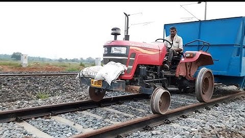 Mahindra yuvo tractor running over the railway track || All about Tractors and Jcb