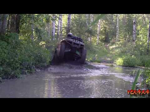 500-arctic-cat-in-the-mud-with-29.5-swamp-lites-on-custom-rims