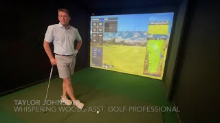 Whispering Woods Assistant Golf Pro Taylor Johnson shows off Trackman golf simulator